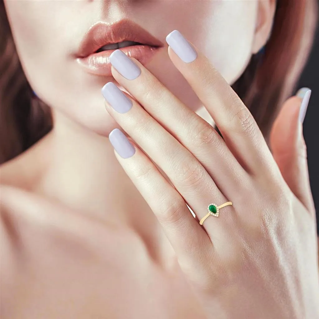 10K Yellow Gold Emerald And Diamond Halo Ring