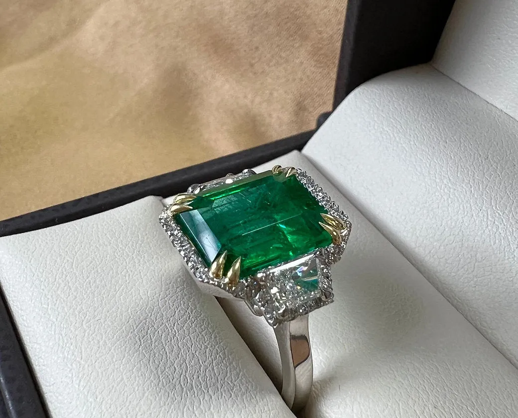 5.30 Carat Emerald 5.30 Carat Three Stone Ring