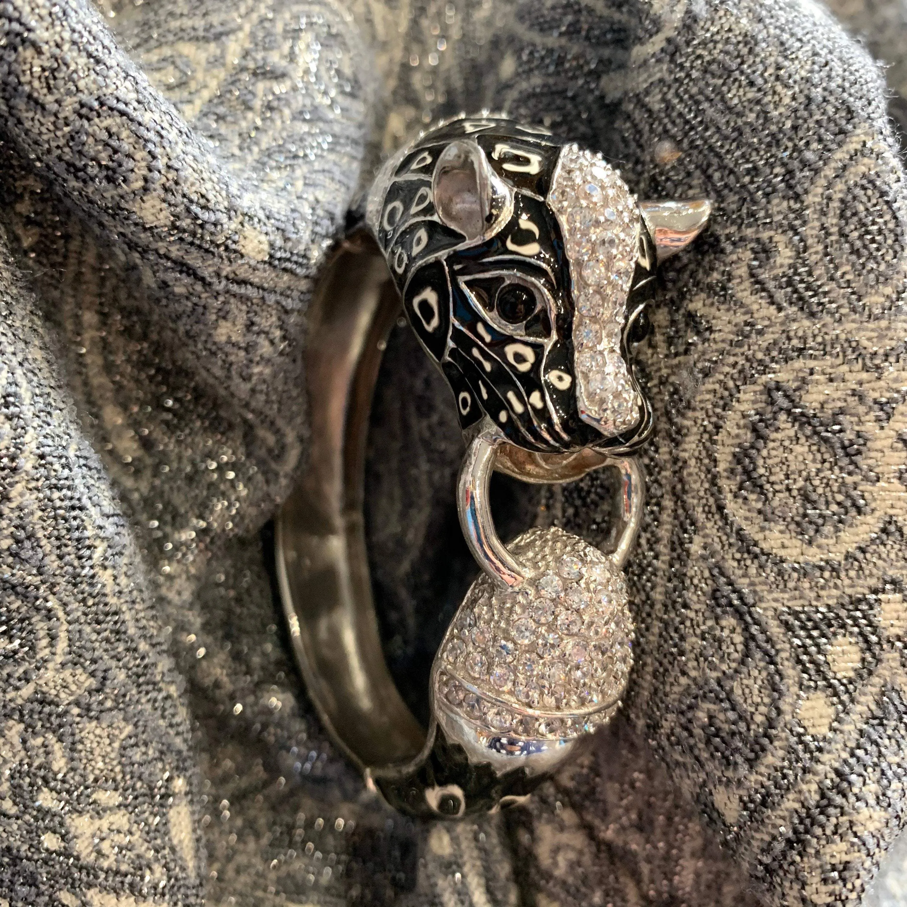 Black snow leopard cuff bracelet in silver enamel
