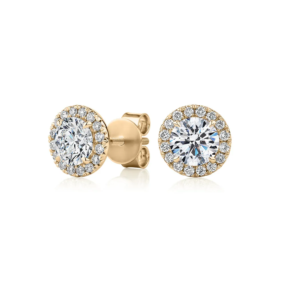 Signature Simulant Diamond 1.67 carat* TW round brilliant halo earrings in 14 carat yellow gold
